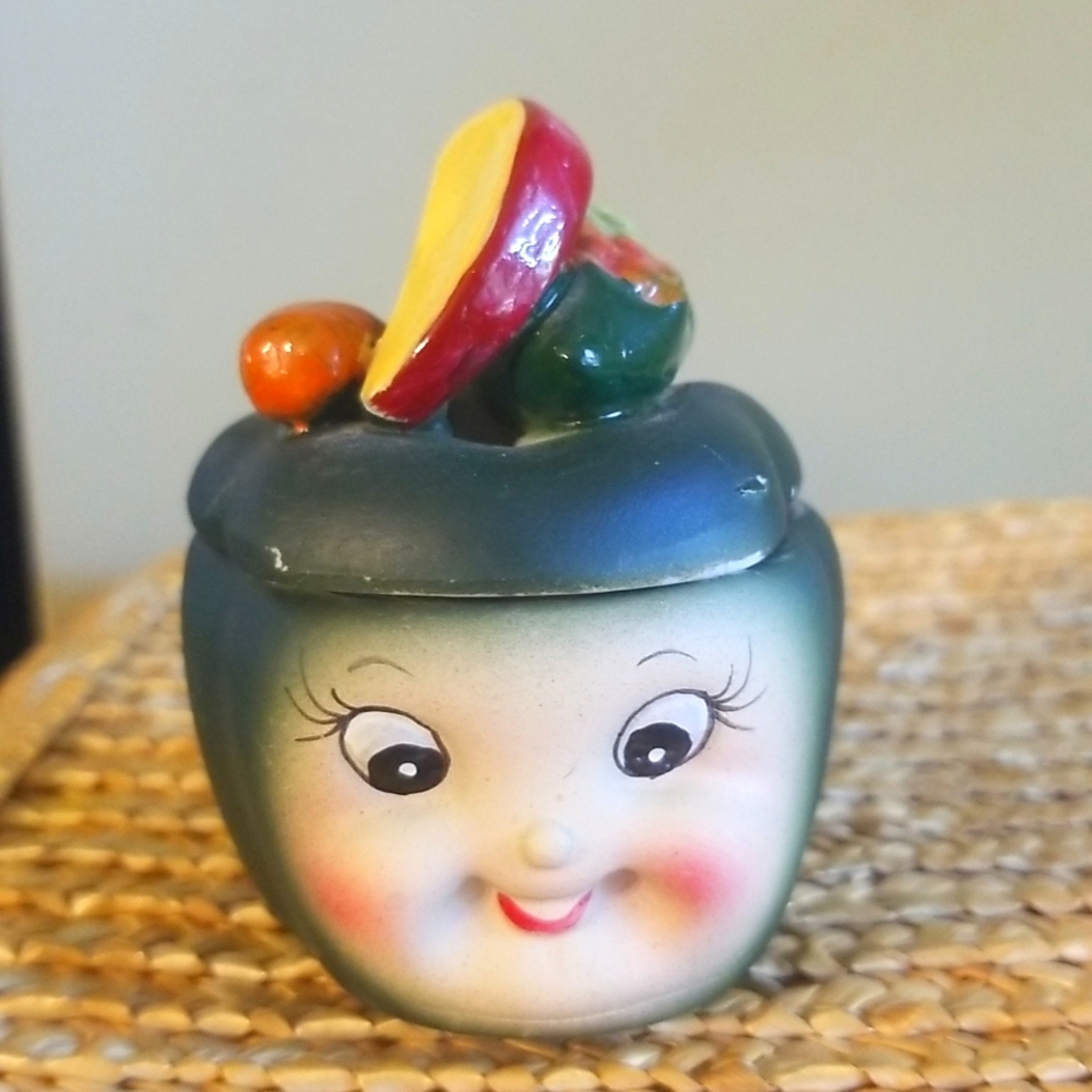 Vintage, collectible anthromorphic jars. Candle.